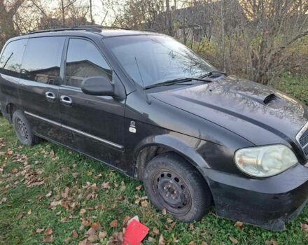 Черный Киа Карнивал, объемом двигателя 2.9 л и пробегом 300 тыс. км за 4600 $, фото 1 на Automoto.ua