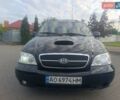 Черный Киа Карнивал, объемом двигателя 2.9 л и пробегом 280 тыс. км за 4400 $, фото 22 на Automoto.ua