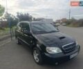 Черный Киа Карнивал, объемом двигателя 2.9 л и пробегом 280 тыс. км за 4400 $, фото 2 на Automoto.ua
