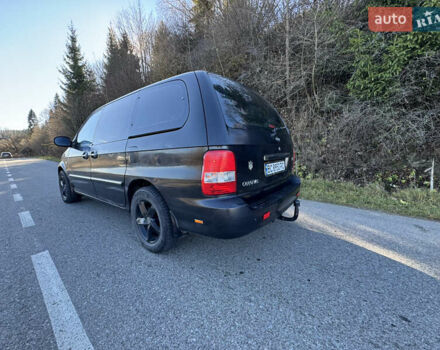 Черный Киа Карнивал, объемом двигателя 2.9 л и пробегом 245 тыс. км за 3250 $, фото 4 на Automoto.ua