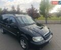 Черный Киа Карнивал, объемом двигателя 2.9 л и пробегом 280 тыс. км за 4400 $, фото 21 на Automoto.ua