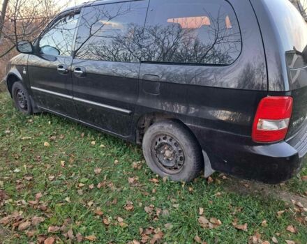 Черный Киа Карнивал, объемом двигателя 2.9 л и пробегом 300 тыс. км за 4600 $, фото 2 на Automoto.ua