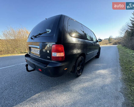 Черный Киа Карнивал, объемом двигателя 2.9 л и пробегом 245 тыс. км за 3250 $, фото 3 на Automoto.ua