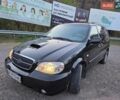 Черный Киа Карнивал, объемом двигателя 2.9 л и пробегом 299 тыс. км за 4400 $, фото 1 на Automoto.ua