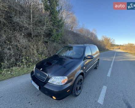 Черный Киа Карнивал, объемом двигателя 2.9 л и пробегом 245 тыс. км за 3250 $, фото 1 на Automoto.ua