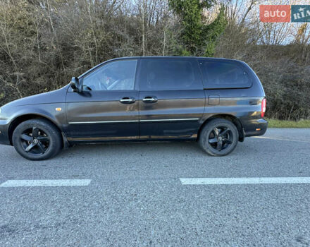 Черный Киа Карнивал, объемом двигателя 2.9 л и пробегом 245 тыс. км за 3250 $, фото 5 на Automoto.ua