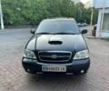 Чорний Кіа Карнівал, об'ємом двигуна 2.9 л та пробігом 220 тис. км за 4500 $, фото 1 на Automoto.ua