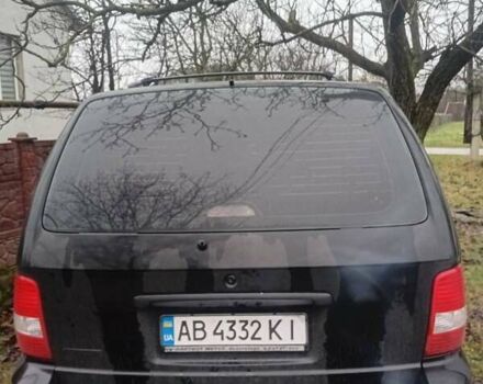 Черный Киа Карнивал, объемом двигателя 2.8 л и пробегом 300 тыс. км за 3800 $, фото 2 на Automoto.ua