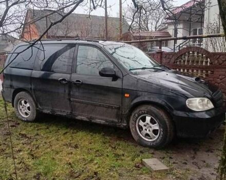 Черный Киа Карнивал, объемом двигателя 2.8 л и пробегом 300 тыс. км за 3800 $, фото 3 на Automoto.ua