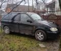 Черный Киа Карнивал, объемом двигателя 2.8 л и пробегом 300 тыс. км за 3800 $, фото 3 на Automoto.ua