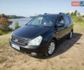 Черный Киа Карнивал, объемом двигателя 2.9 л и пробегом 265 тыс. км за 5850 $, фото 1 на Automoto.ua