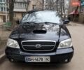 Черный Киа Карнивал, объемом двигателя 2.9 л и пробегом 300 тыс. км за 5200 $, фото 1 на Automoto.ua