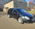 Черный Киа Карнивал, объемом двигателя 2.66 л и пробегом 310 тыс. км за 5800 $, фото 1 на Automoto.ua