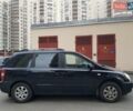 Черный Киа Карнивал, объемом двигателя 2.66 л и пробегом 350 тыс. км за 5900 $, фото 5 на Automoto.ua