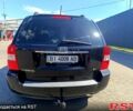 Черный Киа Карнивал, объемом двигателя 2.9 л и пробегом 284 тыс. км за 6200 $, фото 5 на Automoto.ua