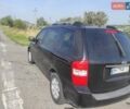 Черный Киа Карнивал, объемом двигателя 2.9 л и пробегом 288 тыс. км за 4999 $, фото 1 на Automoto.ua