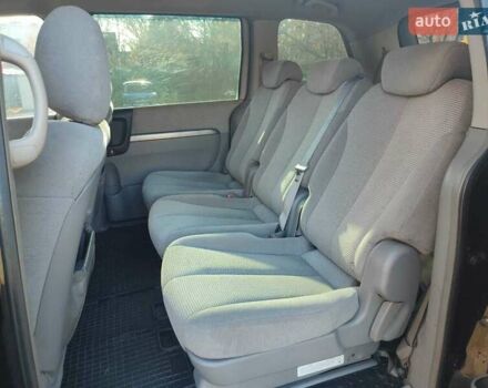 Черный Киа Карнивал, объемом двигателя 2.66 л и пробегом 310 тыс. км за 5800 $, фото 7 на Automoto.ua