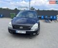 Черный Киа Карнивал, объемом двигателя 2.9 л и пробегом 282 тыс. км за 6999 $, фото 1 на Automoto.ua