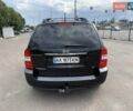 Черный Киа Карнивал, объемом двигателя 2.9 л и пробегом 235 тыс. км за 6200 $, фото 6 на Automoto.ua