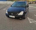 Черный Киа Карнивал, объемом двигателя 2.9 л и пробегом 238 тыс. км за 4700 $, фото 1 на Automoto.ua