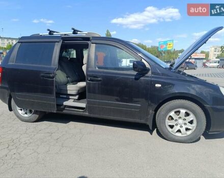 Черный Киа Карнивал, объемом двигателя 2.9 л и пробегом 284 тыс. км за 6200 $, фото 7 на Automoto.ua