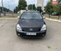 Черный Киа Карнивал, объемом двигателя 2.9 л и пробегом 235 тыс. км за 6200 $, фото 1 на Automoto.ua