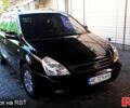 Черный Киа Карнивал, объемом двигателя 2.8 л и пробегом 200 тыс. км за 10500 $, фото 1 на Automoto.ua
