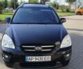 Чорний Кіа Карнівал, об'ємом двигуна 2 л та пробігом 246 тис. км за 6300 $, фото 1 на Automoto.ua
