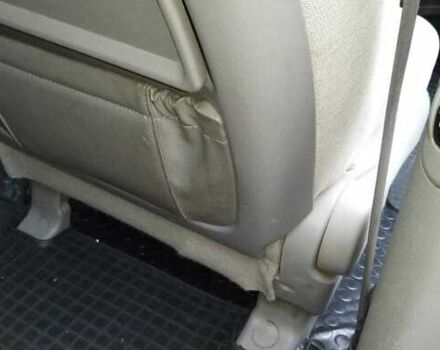 Черный Киа Карнивал, объемом двигателя 2.66 л и пробегом 310 тыс. км за 5800 $, фото 15 на Automoto.ua