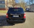 Черный Киа Карнивал, объемом двигателя 2.66 л и пробегом 310 тыс. км за 5800 $, фото 5 на Automoto.ua