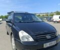 Черный Киа Карнивал, объемом двигателя 2.92 л и пробегом 284 тыс. км за 6500 $, фото 1 на Automoto.ua