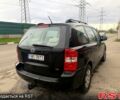 Черный Киа Карнивал, объемом двигателя 2.9 л и пробегом 183 тыс. км за 2800 $, фото 1 на Automoto.ua