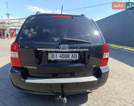 Черный Киа Карнивал, объемом двигателя 2.9 л и пробегом 284 тыс. км за 6200 $, фото 2 на Automoto.ua