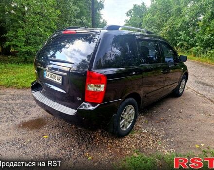 Черный Киа Карнивал, объемом двигателя 2.7 л и пробегом 215 тыс. км за 6500 $, фото 2 на Automoto.ua