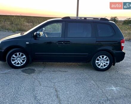 Черный Киа Карнивал, объемом двигателя 2.9 л и пробегом 292 тыс. км за 7300 $, фото 3 на Automoto.ua