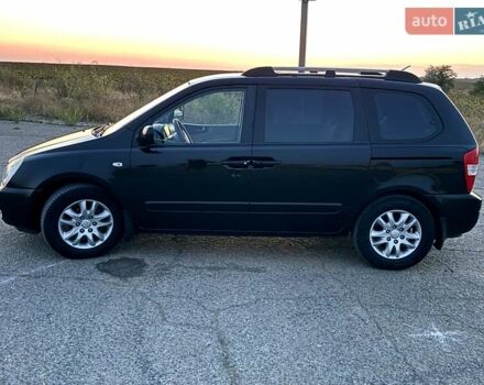 Черный Киа Карнивал, объемом двигателя 2.9 л и пробегом 292 тыс. км за 7300 $, фото 5 на Automoto.ua