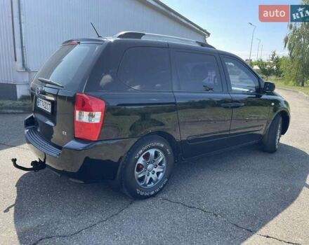Черный Киа Карнивал, объемом двигателя 2.9 л и пробегом 223 тыс. км за 6300 $, фото 3 на Automoto.ua