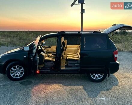 Черный Киа Карнивал, объемом двигателя 2.9 л и пробегом 292 тыс. км за 7300 $, фото 15 на Automoto.ua