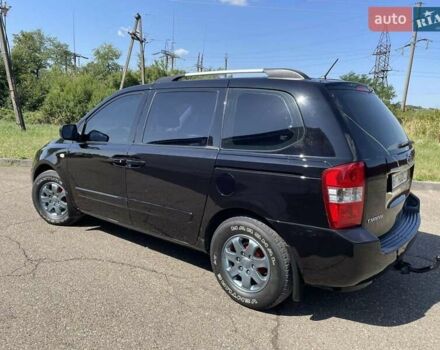 Черный Киа Карнивал, объемом двигателя 2.9 л и пробегом 223 тыс. км за 6300 $, фото 16 на Automoto.ua
