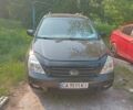 Черный Киа Карнивал, объемом двигателя 2.9 л и пробегом 253 тыс. км за 5500 $, фото 1 на Automoto.ua