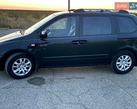 Черный Киа Карнивал, объемом двигателя 2.9 л и пробегом 292 тыс. км за 7300 $, фото 6 на Automoto.ua