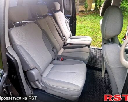 Черный Киа Карнивал, объемом двигателя 2.7 л и пробегом 215 тыс. км за 6500 $, фото 9 на Automoto.ua