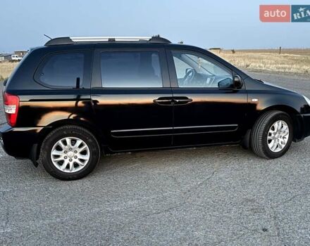 Черный Киа Карнивал, объемом двигателя 2.9 л и пробегом 292 тыс. км за 7300 $, фото 12 на Automoto.ua