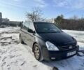 Черный Киа Карнивал, объемом двигателя 2.9 л и пробегом 249 тыс. км за 6300 $, фото 1 на Automoto.ua