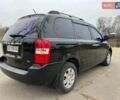 Чорний Кіа Карнівал, об'ємом двигуна 2.66 л та пробігом 372 тис. км за 6500 $, фото 4 на Automoto.ua