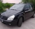 Чорний Кіа Карнівал, об'ємом двигуна 2.9 л та пробігом 171 тис. км за 7189 $, фото 1 на Automoto.ua
