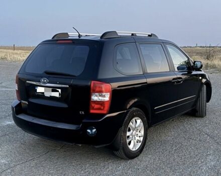 Черный Киа Карнивал, объемом двигателя 2.9 л и пробегом 262 тыс. км за 4500 $, фото 1 на Automoto.ua