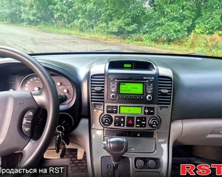 Черный Киа Карнивал, объемом двигателя 2.7 л и пробегом 215 тыс. км за 6500 $, фото 11 на Automoto.ua