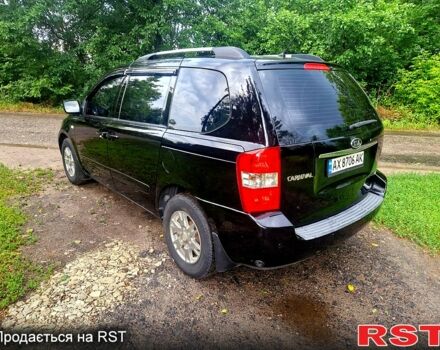 Черный Киа Карнивал, объемом двигателя 2.7 л и пробегом 215 тыс. км за 6500 $, фото 3 на Automoto.ua