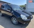 Черный Киа Карнивал, объемом двигателя 2.9 л и пробегом 223 тыс. км за 6300 $, фото 1 на Automoto.ua